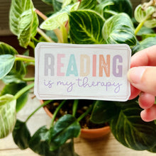 Load image into Gallery viewer, Reading is my therapy waterproof laptop waterbottle anywhere vinyl sticker| book lover sticker| bike sticker | book lover gift