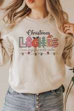 Load image into Gallery viewer, a woman wearing a christmas sweatshirt and jeans