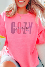 Load image into Gallery viewer, a woman sitting on a couch wearing a pink sweatshirt