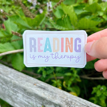 Load image into Gallery viewer, Reading is my therapy waterproof laptop waterbottle anywhere vinyl sticker| book lover sticker| bike sticker | book lover gift