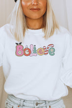 Load image into Gallery viewer, a woman with blonde hair wearing a white sweatshirt